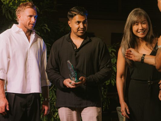 The REVL Potong Pasir team with the Asia Coaching Team of the Year award
